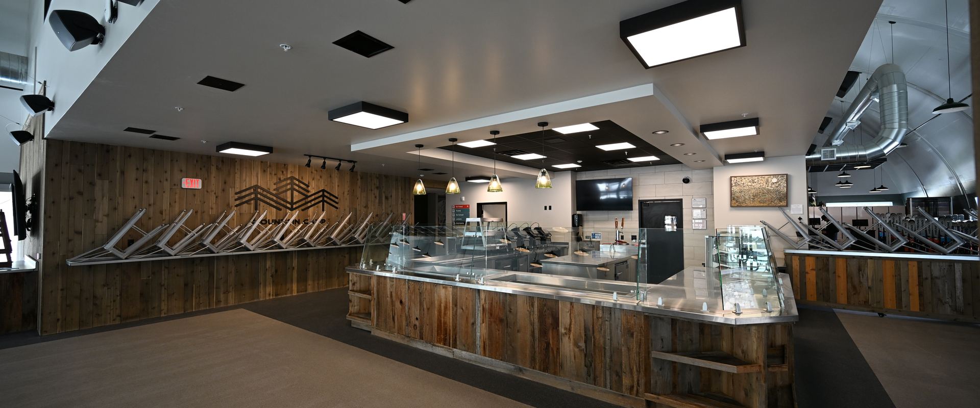 Renovated resort cafeteria with rustic wood counters