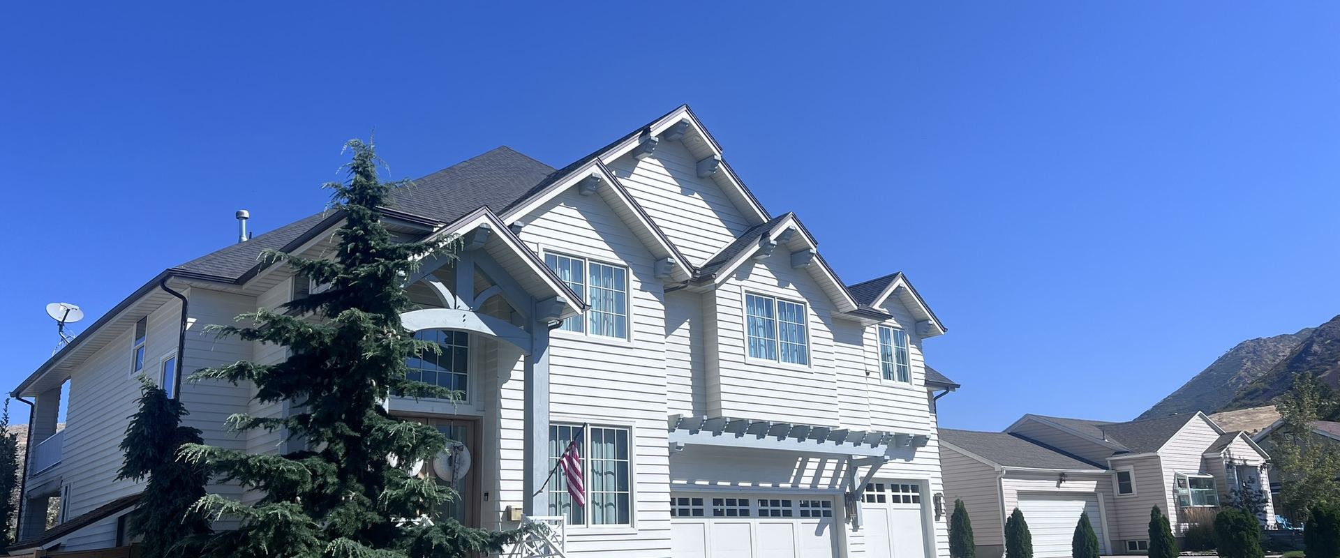 White two-story home after a whole-home remodel