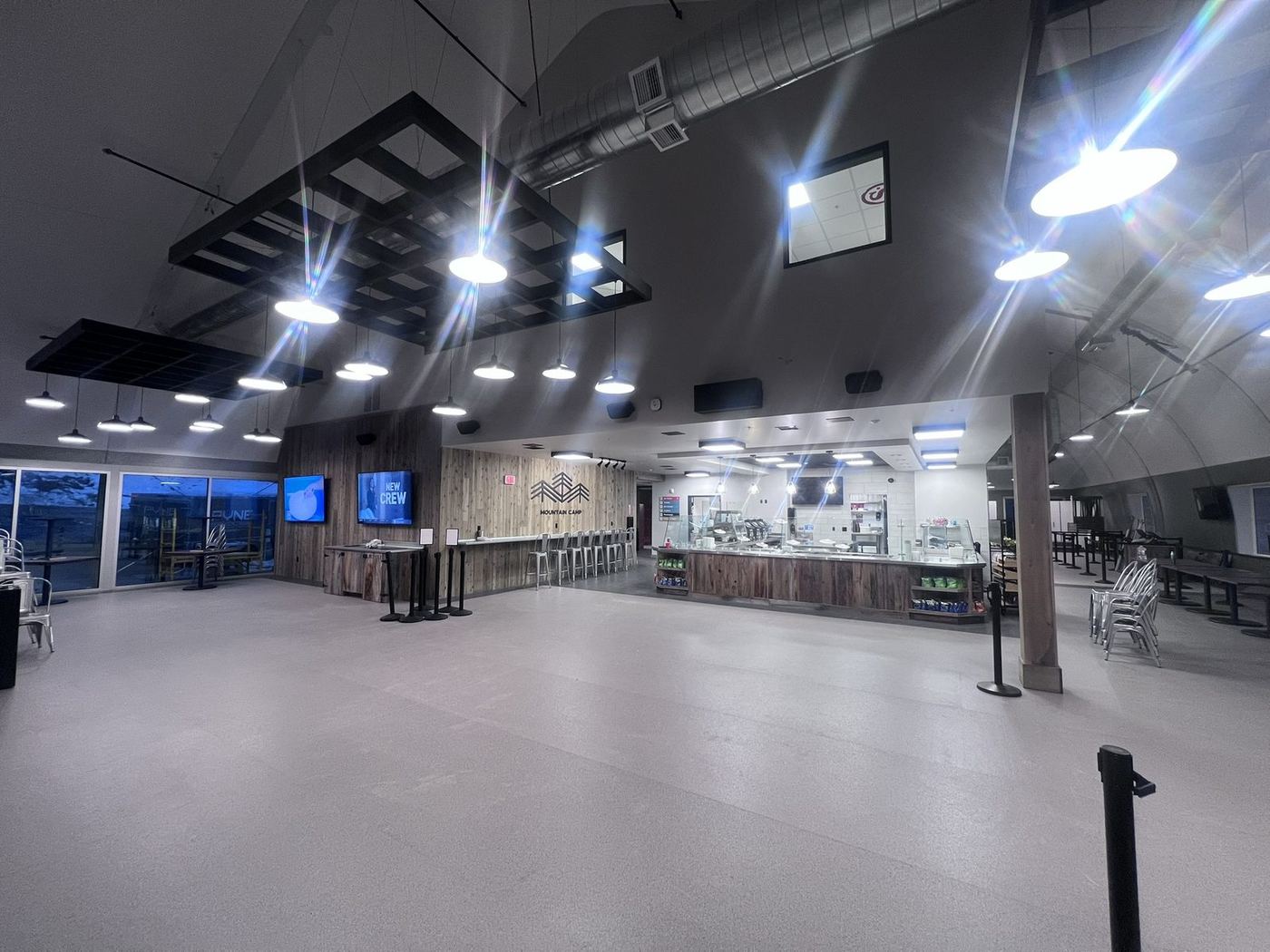 Resort dining hall with modern pendant lighting