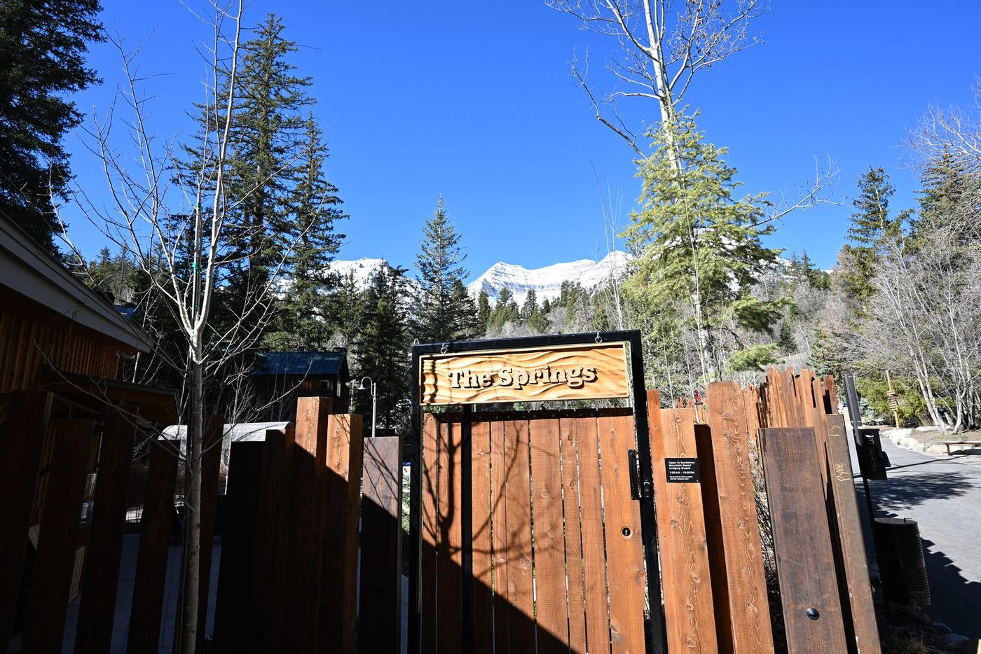 Timber entry gate and sign at The Springs