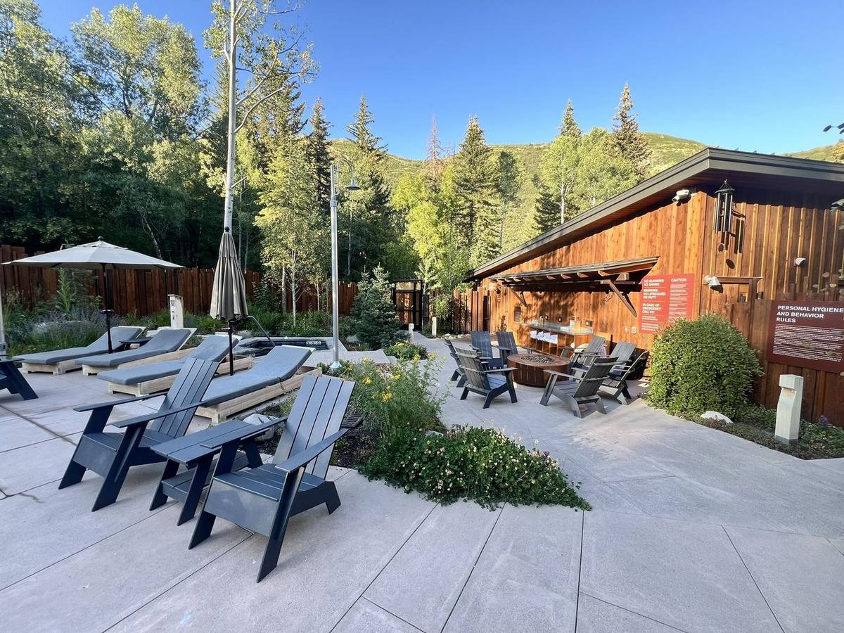 Patio seating in front of the lodge at The Springs