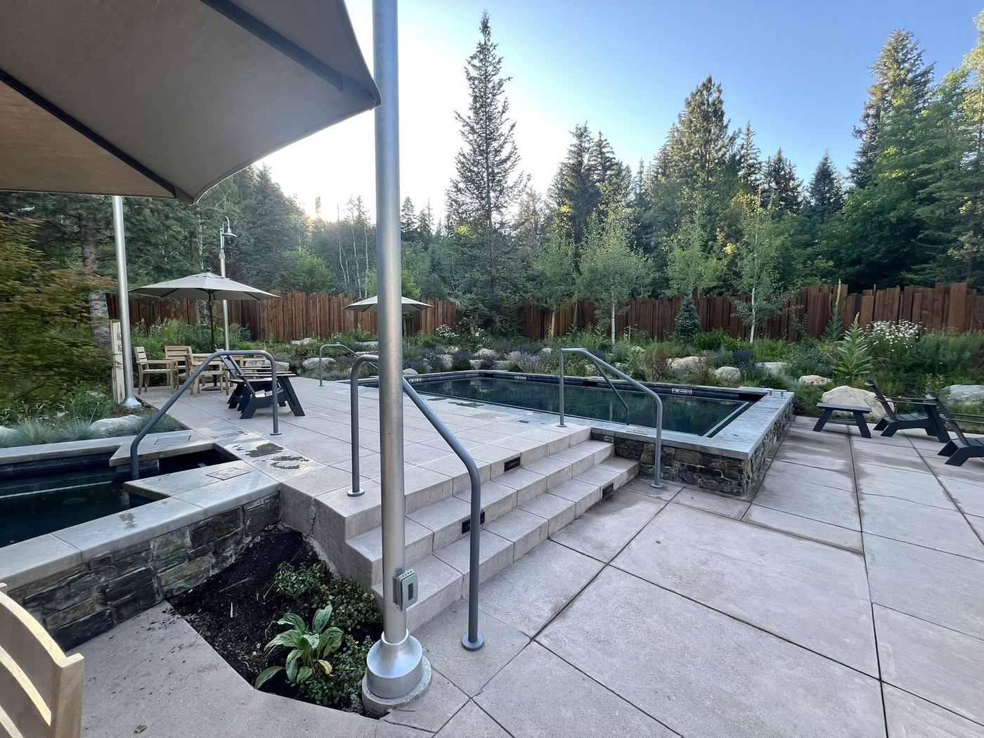 Pool entry steps and stone edging at The Springs